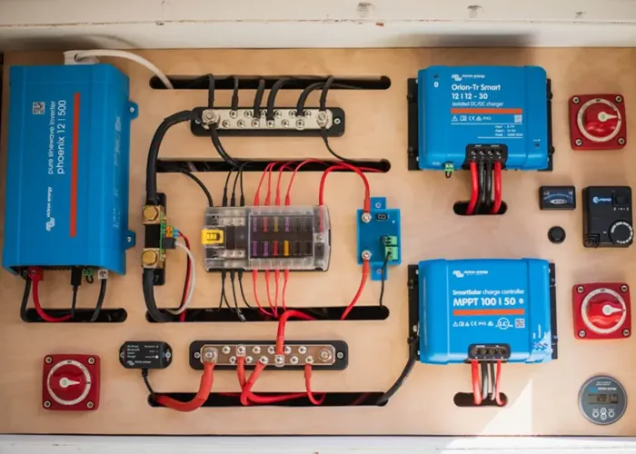 Electrical and solar power system installation in a camper van, featuring Victron Energy components