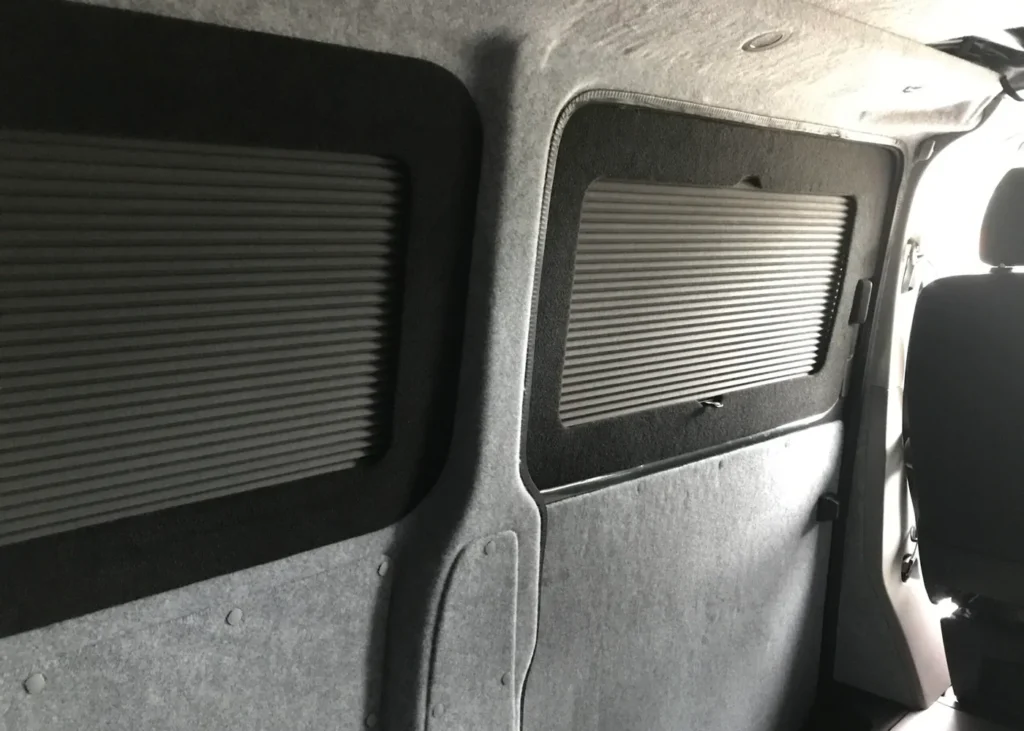 Camper van interior walls with insulated panels